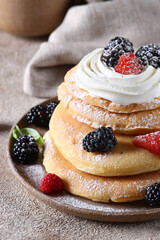 american pancakes with fresh berries for breakfast