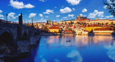 Obraz premium Cityscape - view of the Hradcany historical district of Prague with the castle complex Prague Castle and the Vltava River with the Charles Bridge, Czech Republic, 8 November, 2022