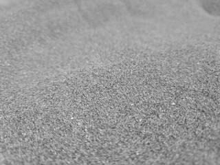 Cloth abstract pattern close macro view, textile abstract background. Black and white monochrome grayscale photo