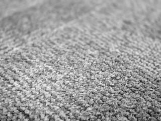 Cloth abstract pattern close view, textile abstract background. Black and white monochrome grayscale photo