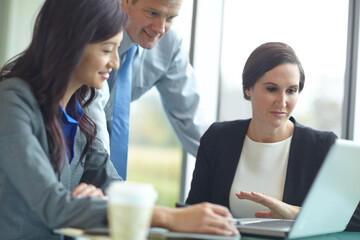 Team, law firm and legal consultant with laptop at office for communication, networking or research for connection. Business people, tech and discussion in group, company and lawyer in brainstorming