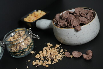 A healthy cereal for breakfast features whole grains, fiber-rich ingredients, and a blend of nuts and seeds, providing a nutritious start to the day with essential vitamins, minerals, and a satisfying