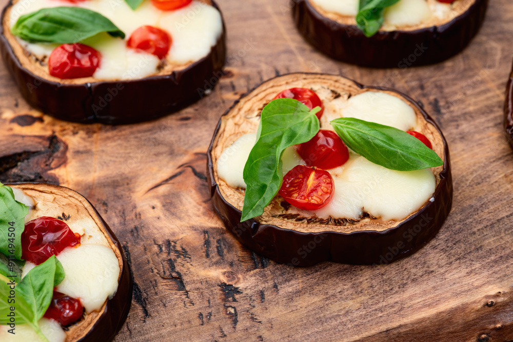 Canvas Prints italian mini pizza . aubergine (eggplant ) with mozzarella cheese and basil . on rustic background