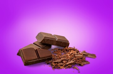 Tasty sweet dark chocolate bar on the desk