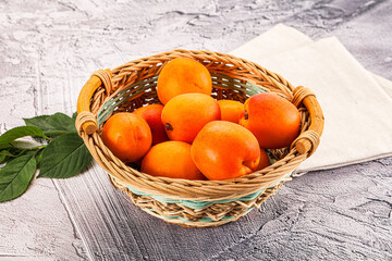 Raw ripe sweet apricots heap