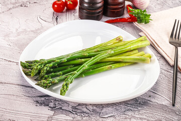 Vegan cuisine - Boiled asparagus with oil