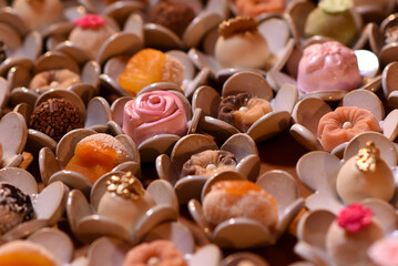 close up of chocolate candies, sweets background, assorted sweets, sweets table, brigadeiro, party sweets, seen from above, top view	