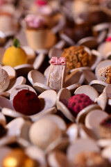 close up of chocolate candies, sweets background, assorted sweets, sweets table, brigadeiro, party...