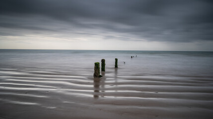 Youghal Strand Groynes on a warm summer morning just before the rain comes