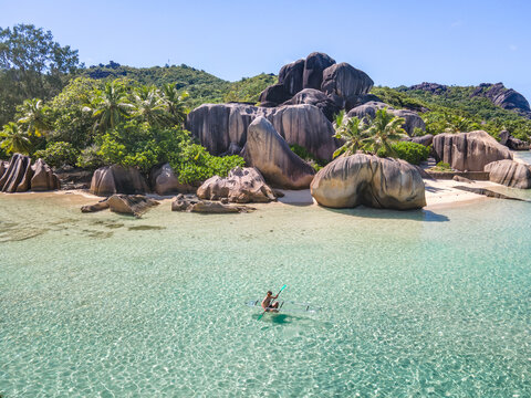 kayaking, travel to paradise tropical beach in Seychelles