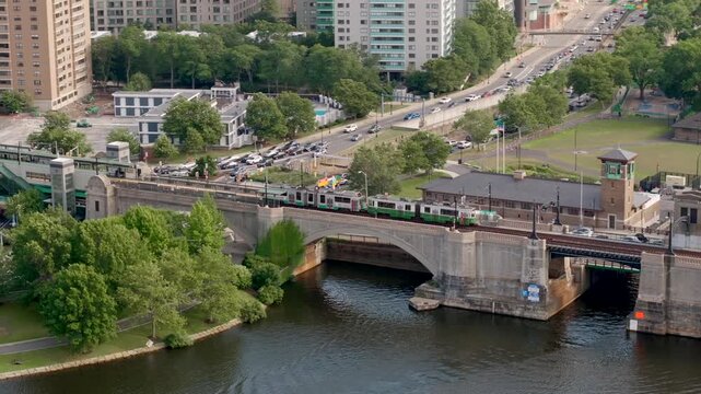 Boston subway train on platform Science Park West End. Aerial drone video 2024