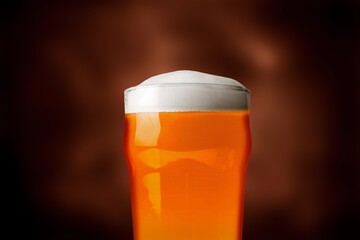 Refreshing cold tasty beer poured into a glass