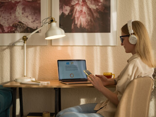 Woman answering message via smartphone