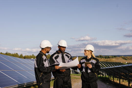 Electricians team working day solar garden energy company
