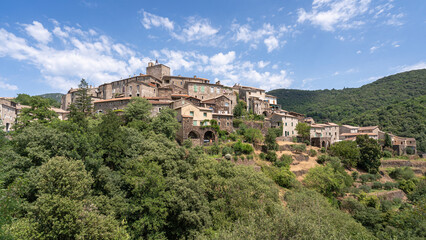 Summer landscape view of medieval St Martial village in the Cévennes National Park, UNESCO World Heritage site, Gard, France
