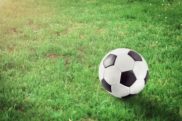 Soccer ball, game Football on green stadium