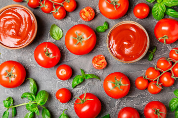 Fresh cherry tomatoes and fresh green basil on a textured background. Tomato sauce. Vegan. Ingredients for salad. Organic food. Place for text. Copy space.