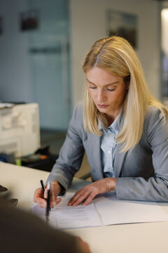 Woman car consultant finalization transaction dealership