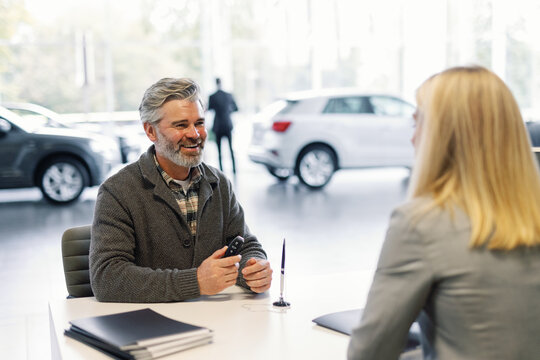 Satisfied customer buying car shop automotive business