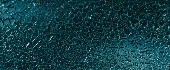 A digital wallpaper featuring a turquoise liquid pattern with bubbles and binary code in the background