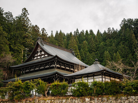 A traditional Japanese temple with ornate wooden architectural details
