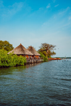 Wood cabins in the river Gambia