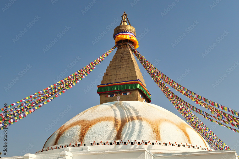 Wall mural The upper part of the Boudhanath Stupa, many colorful prayer flags are attached to it, Kathmandu, Nepal