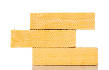 Several vanilla wafers, macro, isolated on white background.