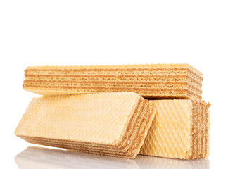 Several vanilla wafers, macro, isolated on white background.