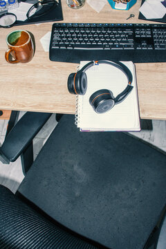 Home Office Desk Setup with Computer, notebook, and Coffee Cup