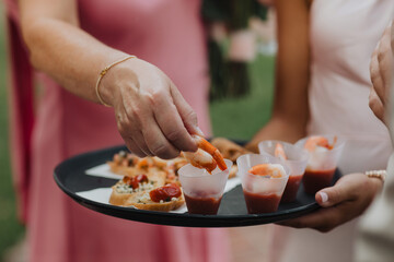 guests served shrimp cocktail appetizers at outdoor event elegant catering ideas for special occasions