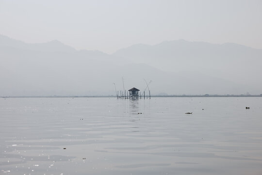 Misty Lake with Fishing Hut