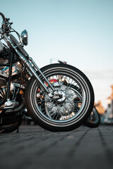 Fototapeta premium Custom chopper motorcycle wheel, chrome spoked wheels and tyre