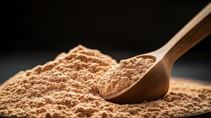 Protein powder scoop resting in a mound of whey protein, soft lighting, sports nutrition concept