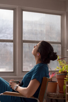 Thoughtful Young Woman At Home
