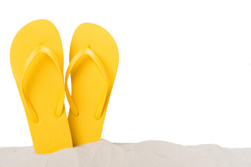 Flip flops on sand against isolated background