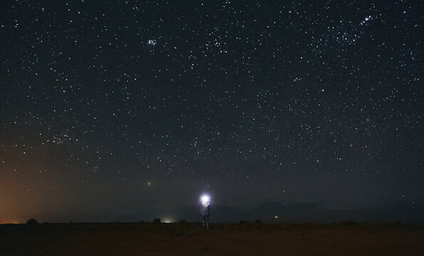 Desert Night with Distant Lights