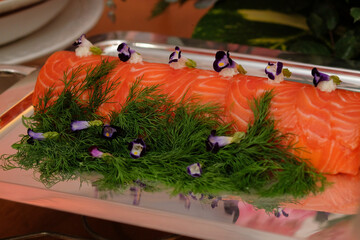 smoked salmon terrine with teriyaki sauce,table setting with flowers