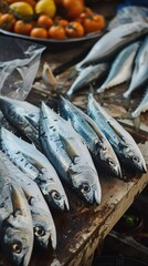 Obraz premium Freshly caught fish on display at a market stall, with ripe persimmons in the background, ready for sale and cooking.