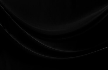 Black gray satin dark fabric texture luxurious shiny that is abstract silk cloth background with patterns soft waves blur beautiful.