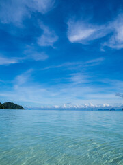 Landscape beautiful summer vertical horizon look view tropical shore open sea beach cloud clean  blue sky background calm nature ocean wave water nobody travel at Koh Kradan Trang Thailand day time