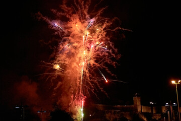 Fireworks Display at Fiesta de la Anunciada in Bayona with Parador Backdrop