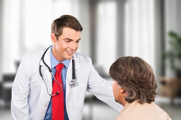 Doctor healthcare and help to patient during a consultation