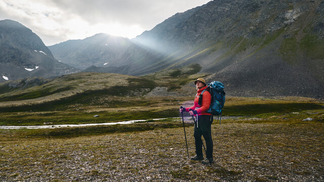 Alaska hiker and light ray 