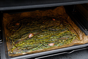 A bunch of fresh organic asparagus beans with spices and salt baked