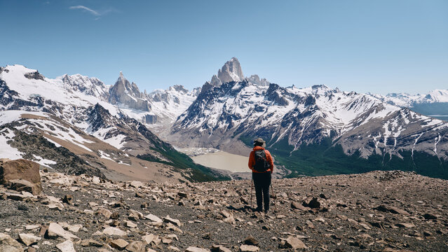 Hiker and Peaks