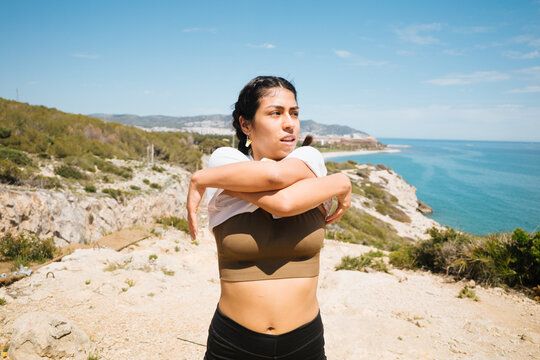 Woman taking shirt off