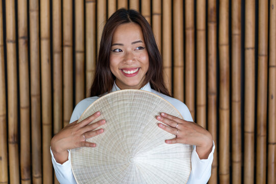 Beautiful East Asian Woman Portrait with Non La Hat