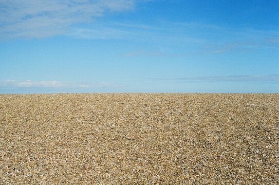 Stony beach and blue sky