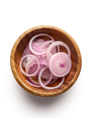 sliced ​​shallots in wooden bowl isolated on white background